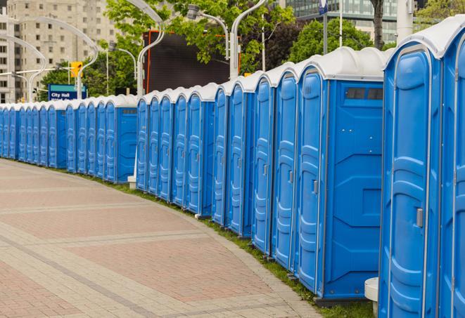 hygienic portable restrooms lined up at a music festival, providing comfort and convenience for attendees in Beverly Hills, CA